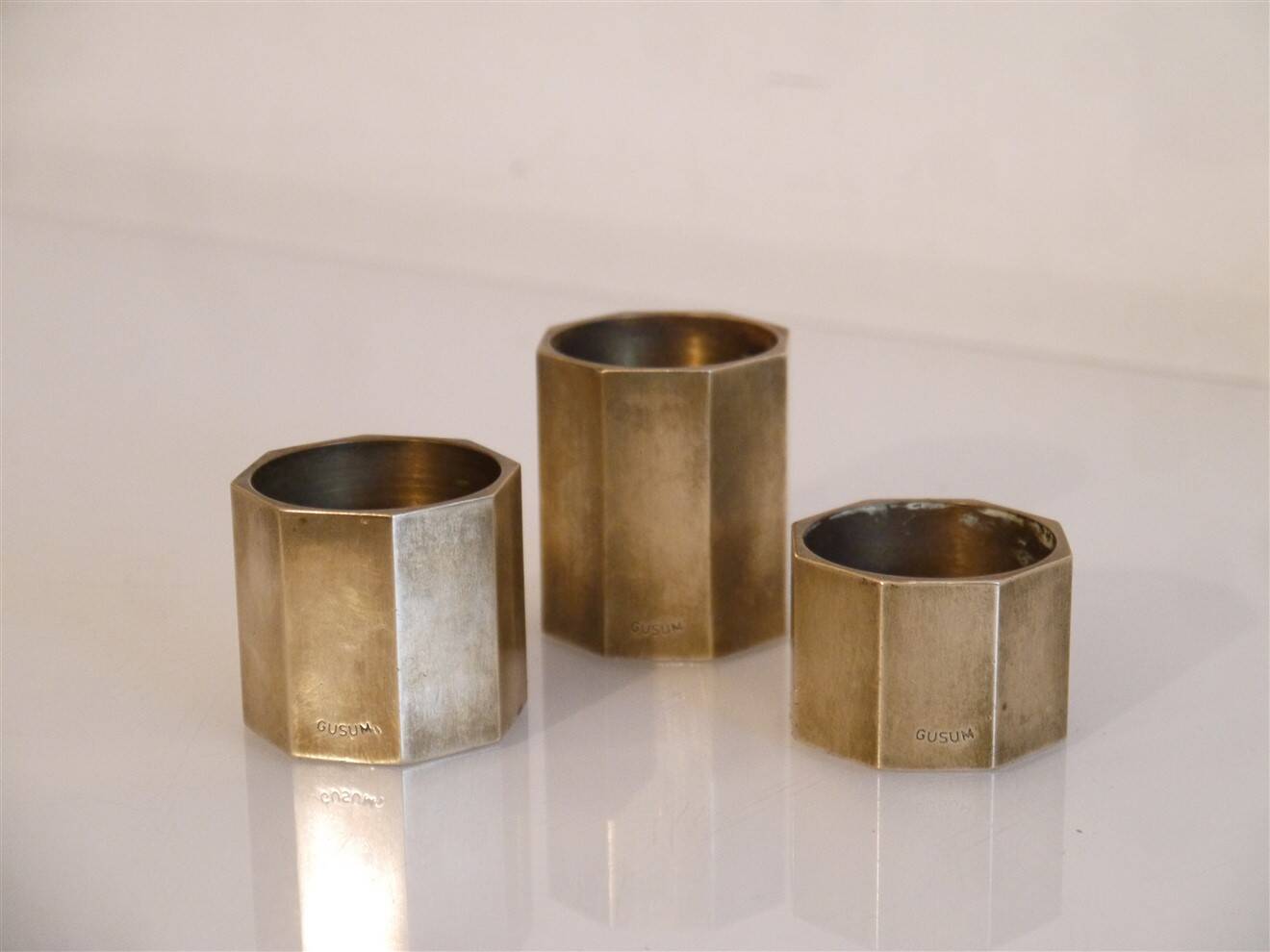 Set of 3 Swedish brass candlesticks