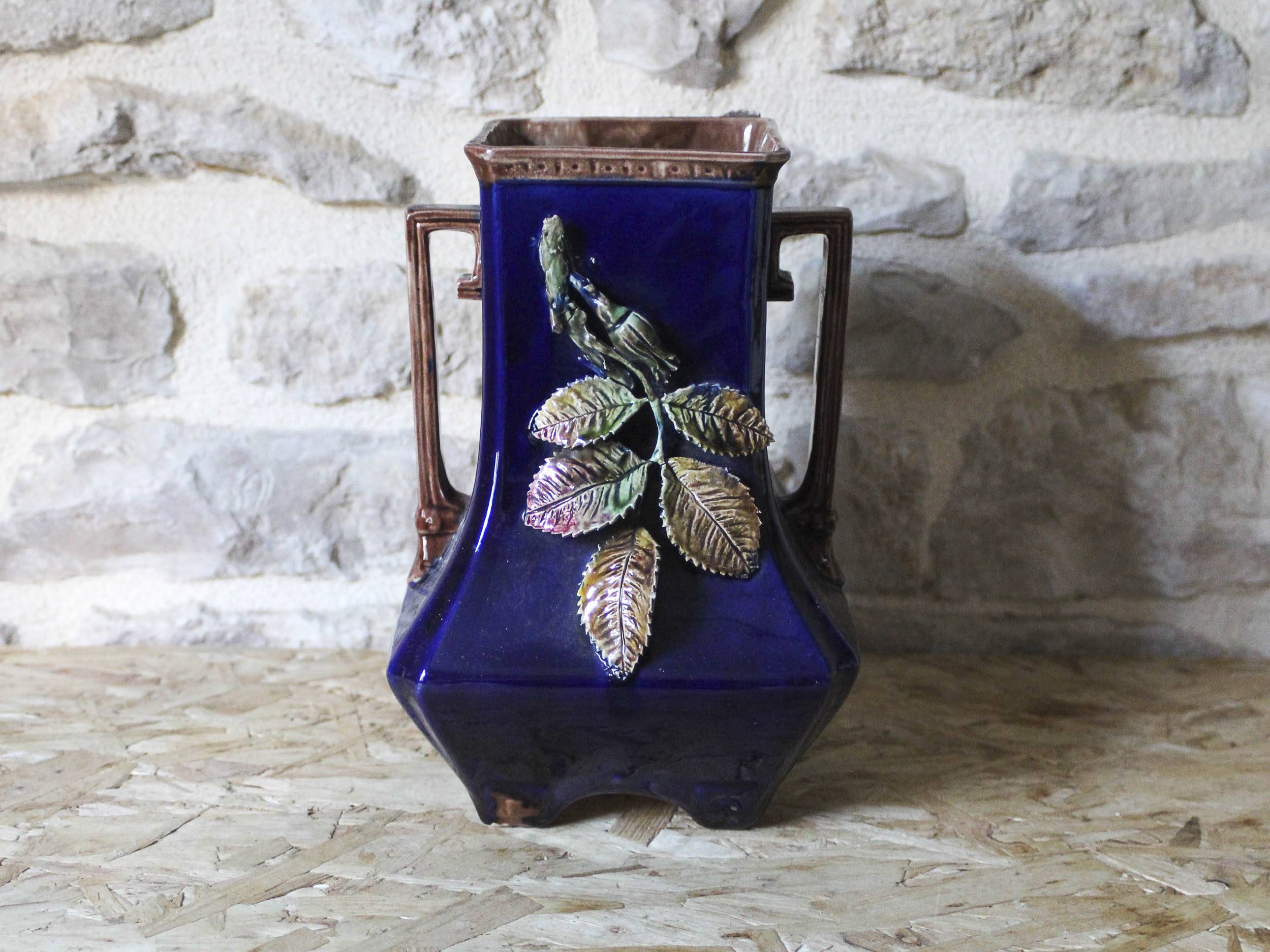 Slip vase decorated with flowers