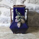 Slip vase decorated with flowers