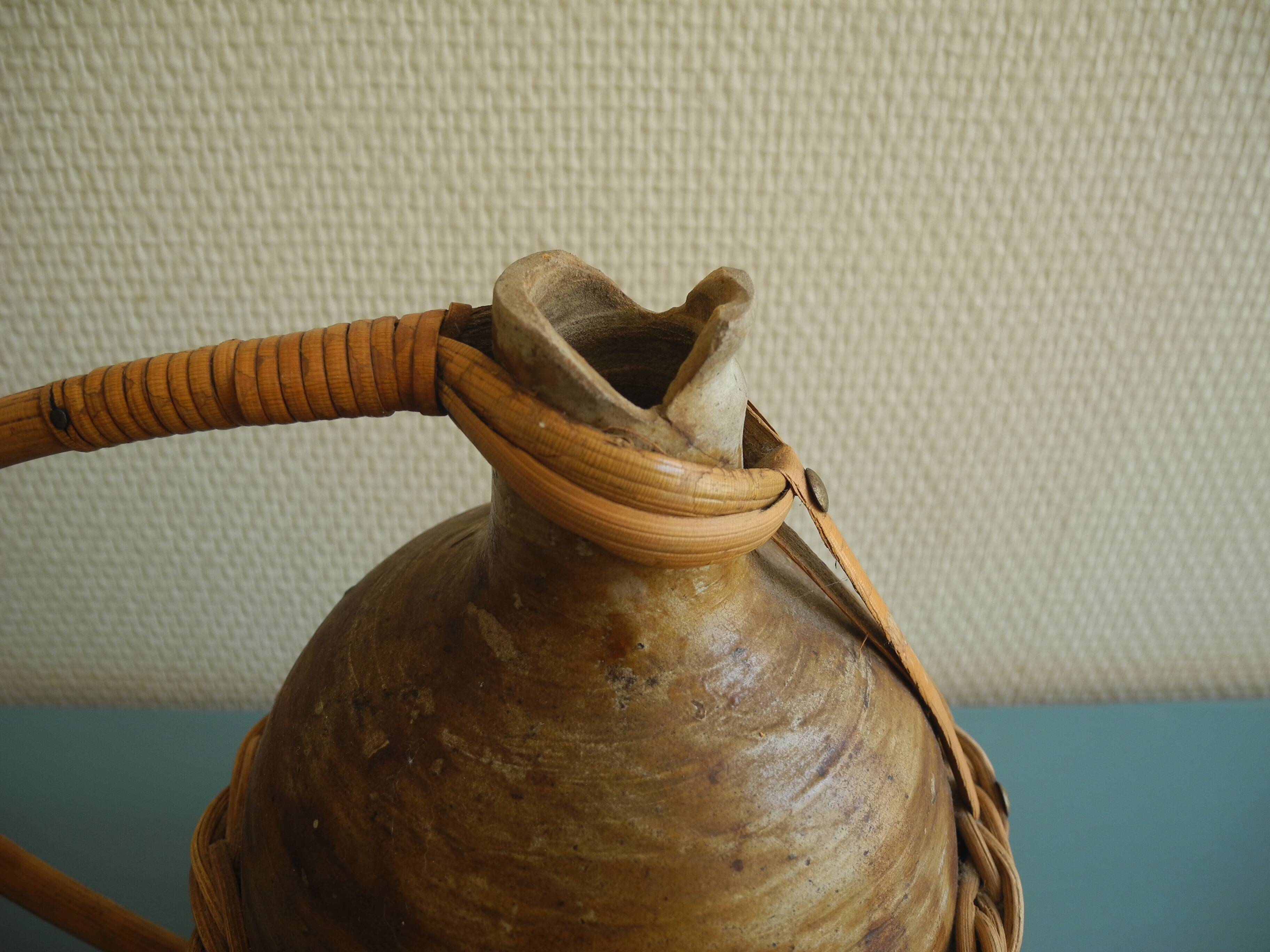 old stoneware bottle wicker vintage decoration stoneware bottle wicker