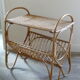 Rattan side table with range records or journals