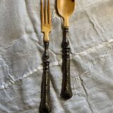 Filled silver salad servers