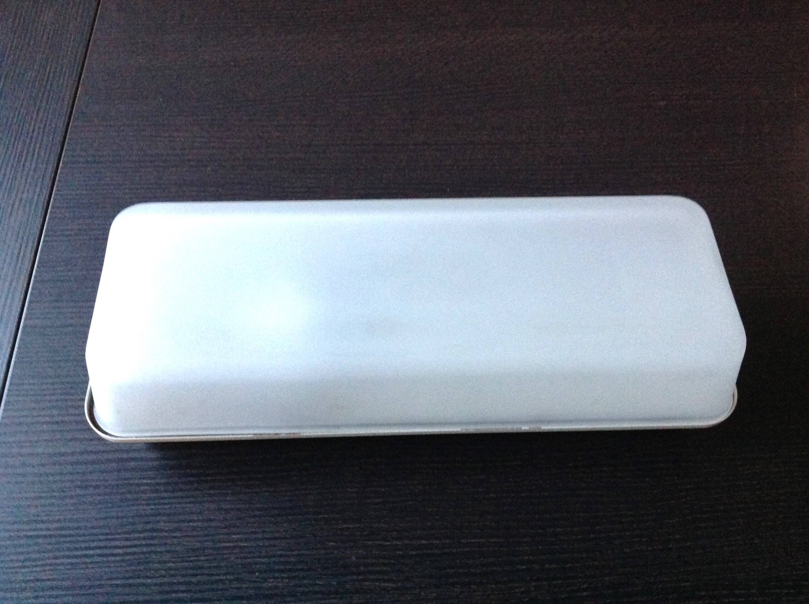 Rectangular porthole wall light in industrial/70s style frosted glass