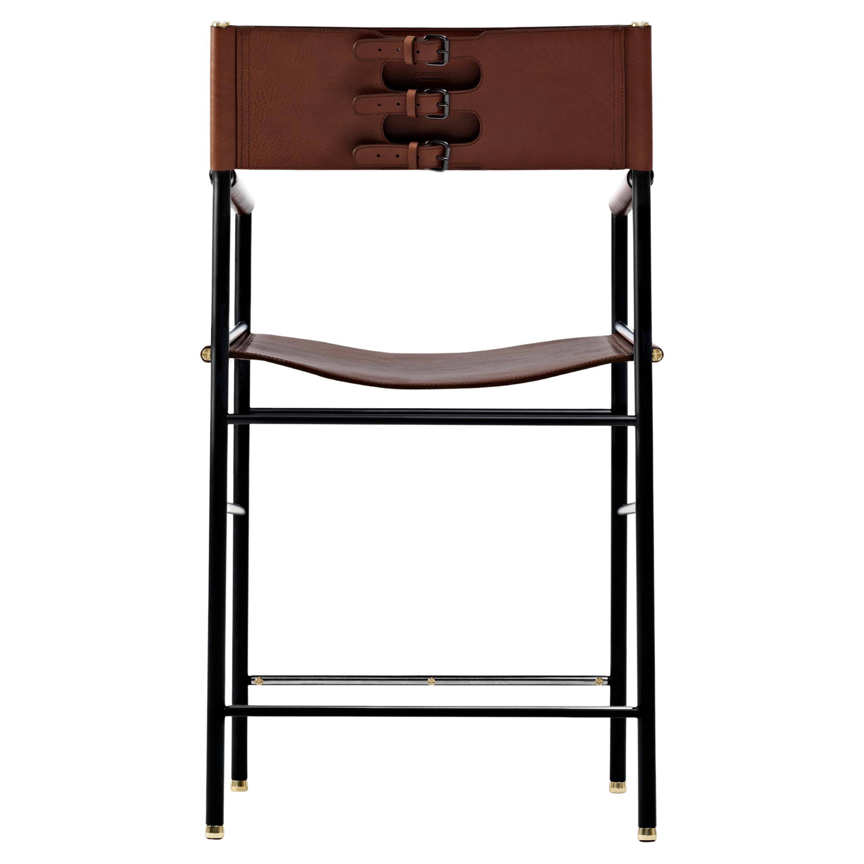 Contemporary classic bar stool with a dark brown leather backrest and black metal.