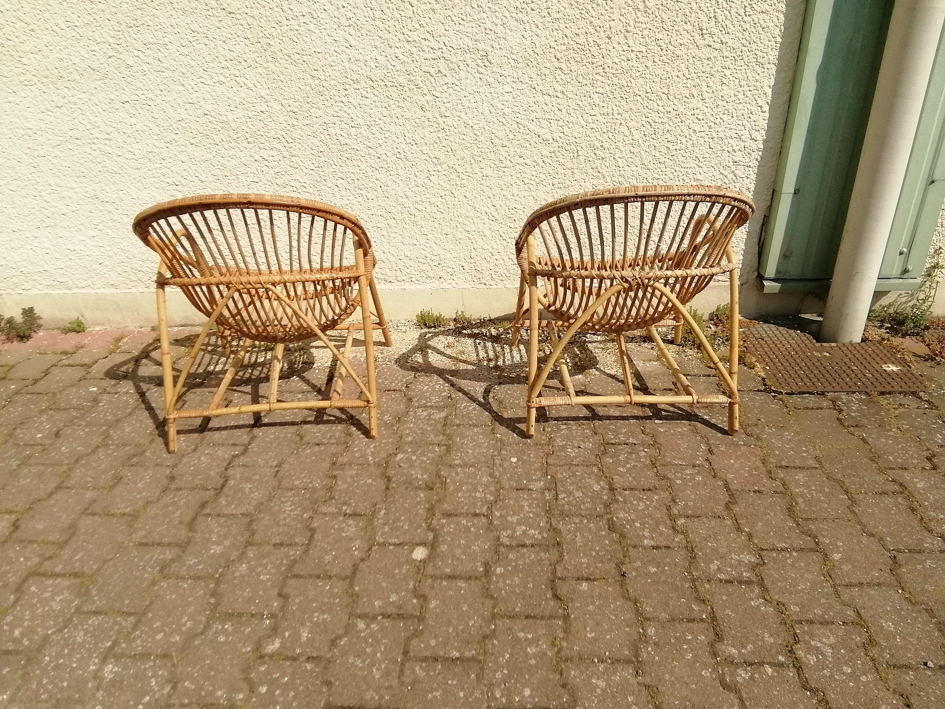 Vintage rattan armchair pair