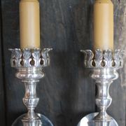 Large pair of silver-plated wall lights with flame globes, torches.
