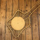 The vintage guitar rattan mirror.