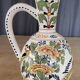 Polychrome earthenware jug, hand-decorated with floral motifs