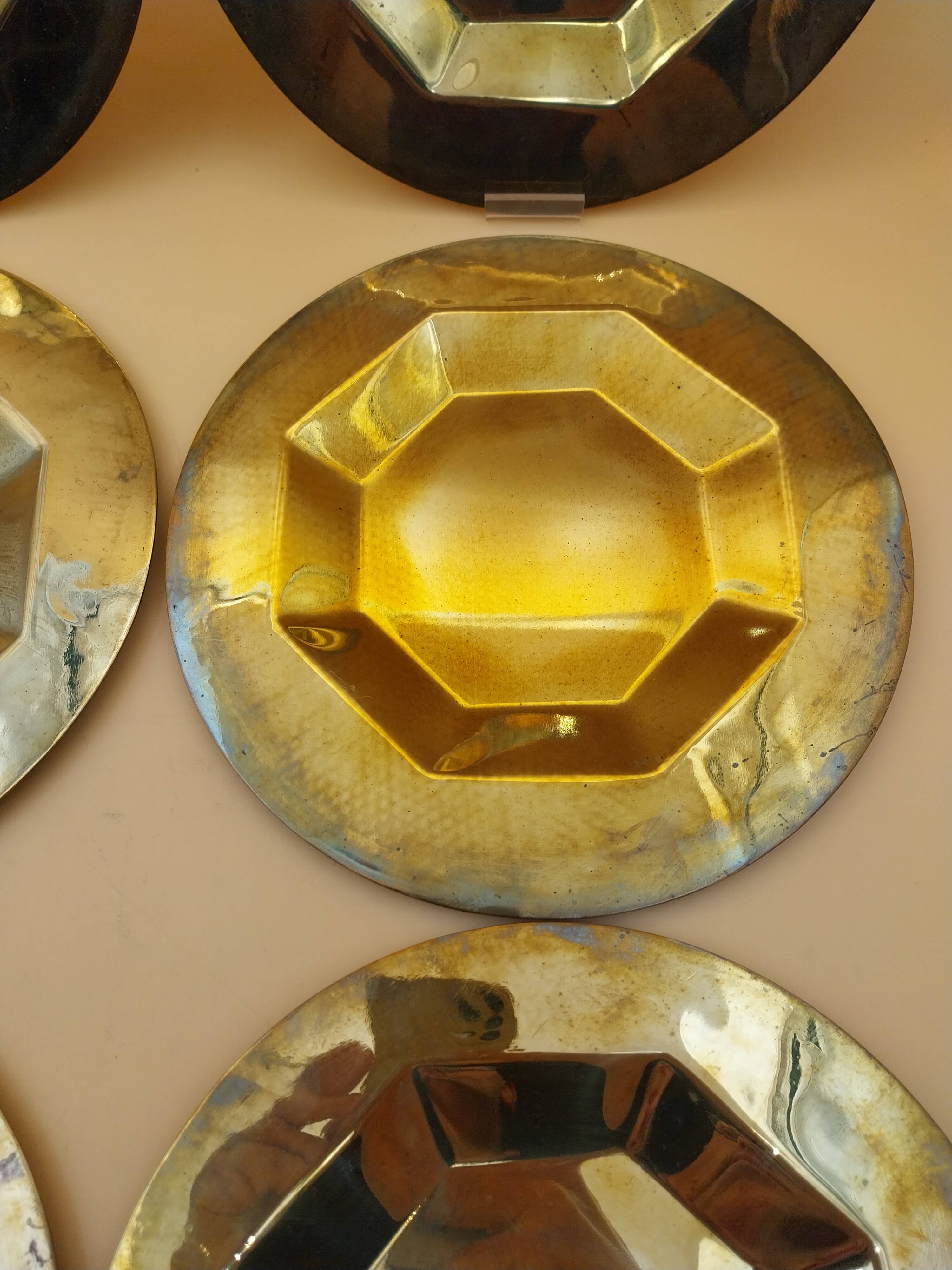6 brass plates under plates