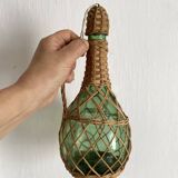 Bottle with rattan weaving