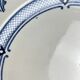 Large round plate Terre de Fer KG Lunéville, model "Jane", blue, 1890-1915.