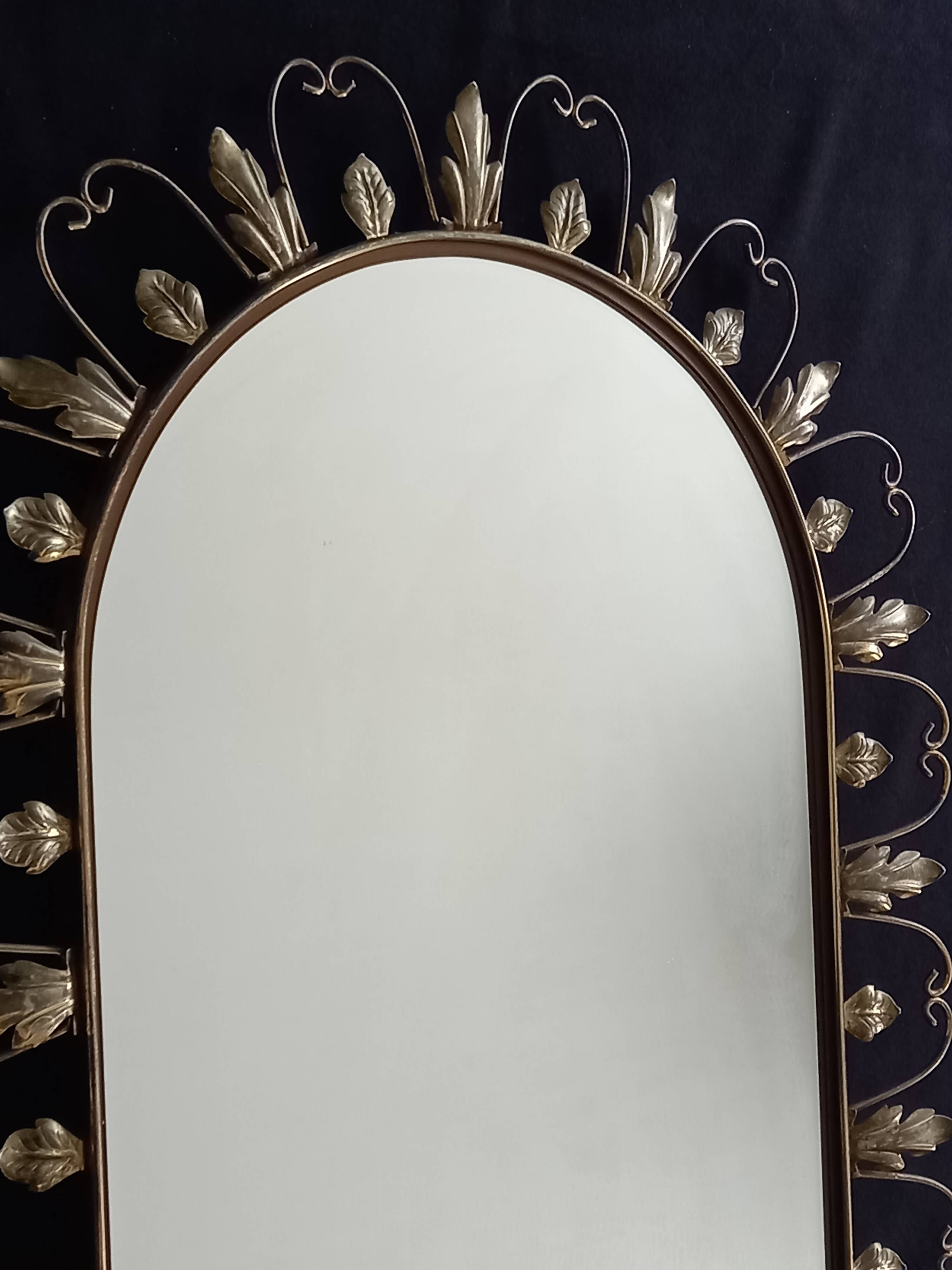 Large arched mirror with acanthus leaves and scrolls in gold metal from deknudt, 1960s
