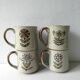 Set of 4  sandstone mugs, bird decor, butterfly, flowers, fish 70 years