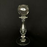 Glass oil lamp blows on foot shower
