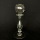 Glass oil lamp blows on foot shower