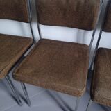 Five chairs in chromed metal and mottled fabric