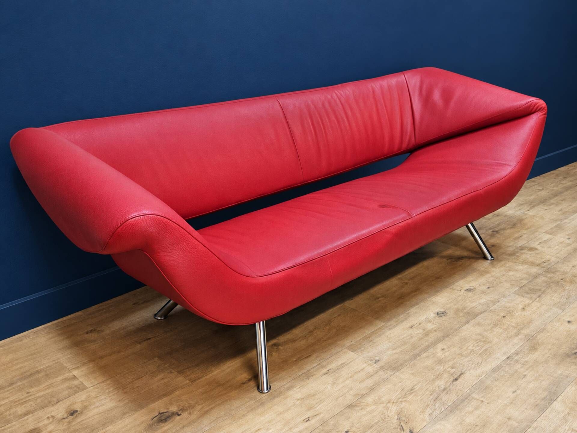 Vintage red leather Leolux Arabella design sofa used