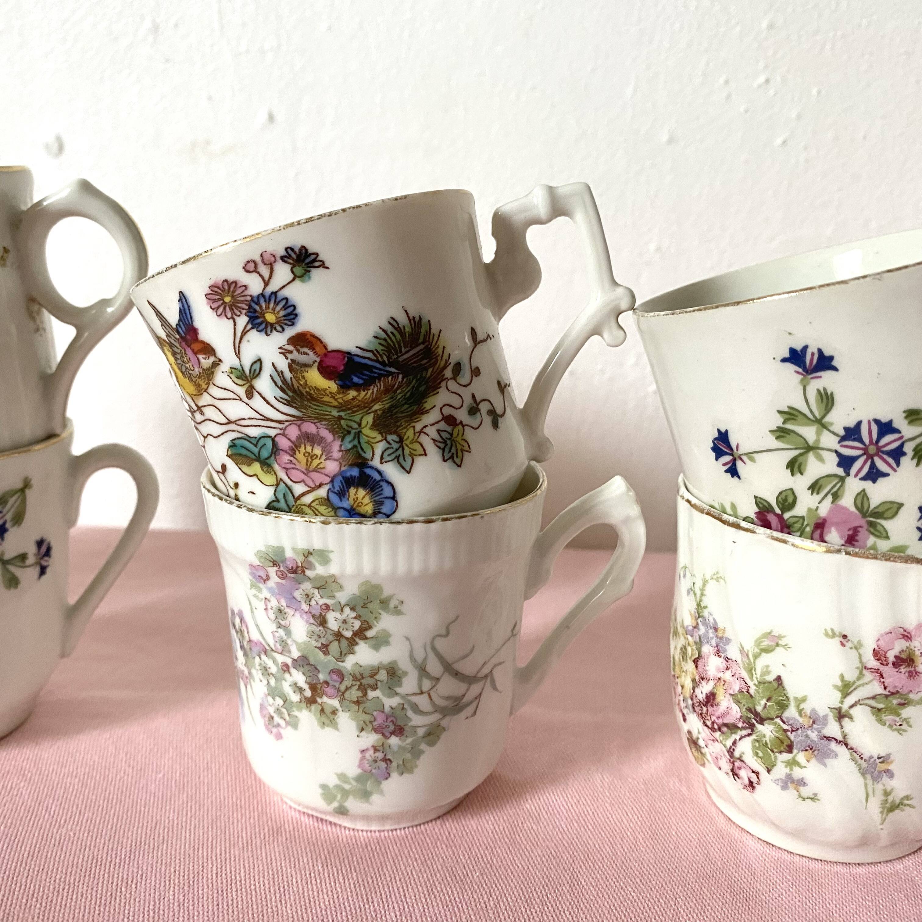 Old flowery coffee cups mismatched