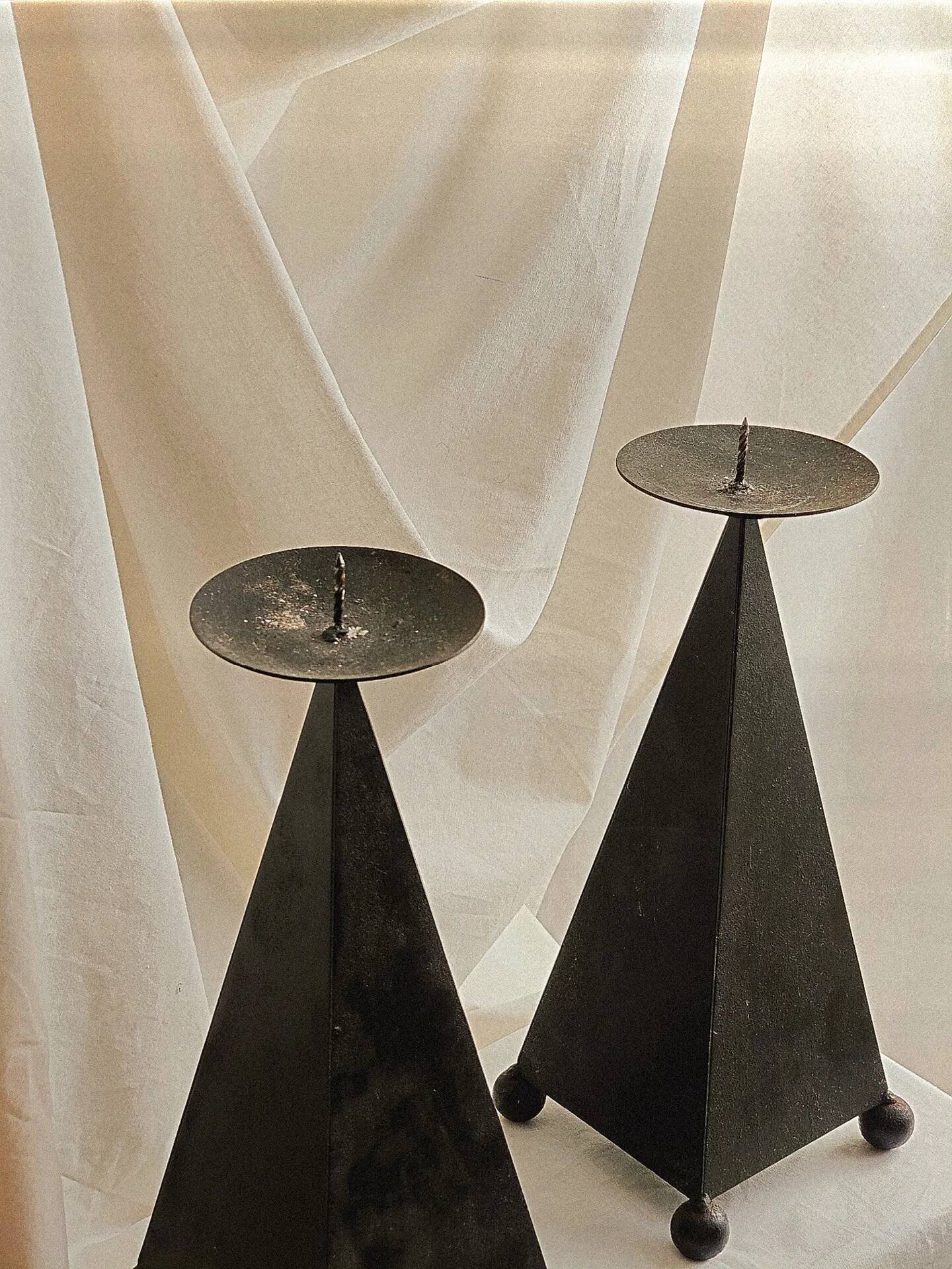 Pair of pyramid-shaped candlesticks in blackened metal (brutalism)