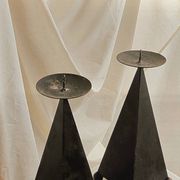 Pair of pyramid-shaped candlesticks in blackened metal (brutalism)