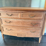 Cherry wood commode with a raw wood finish.