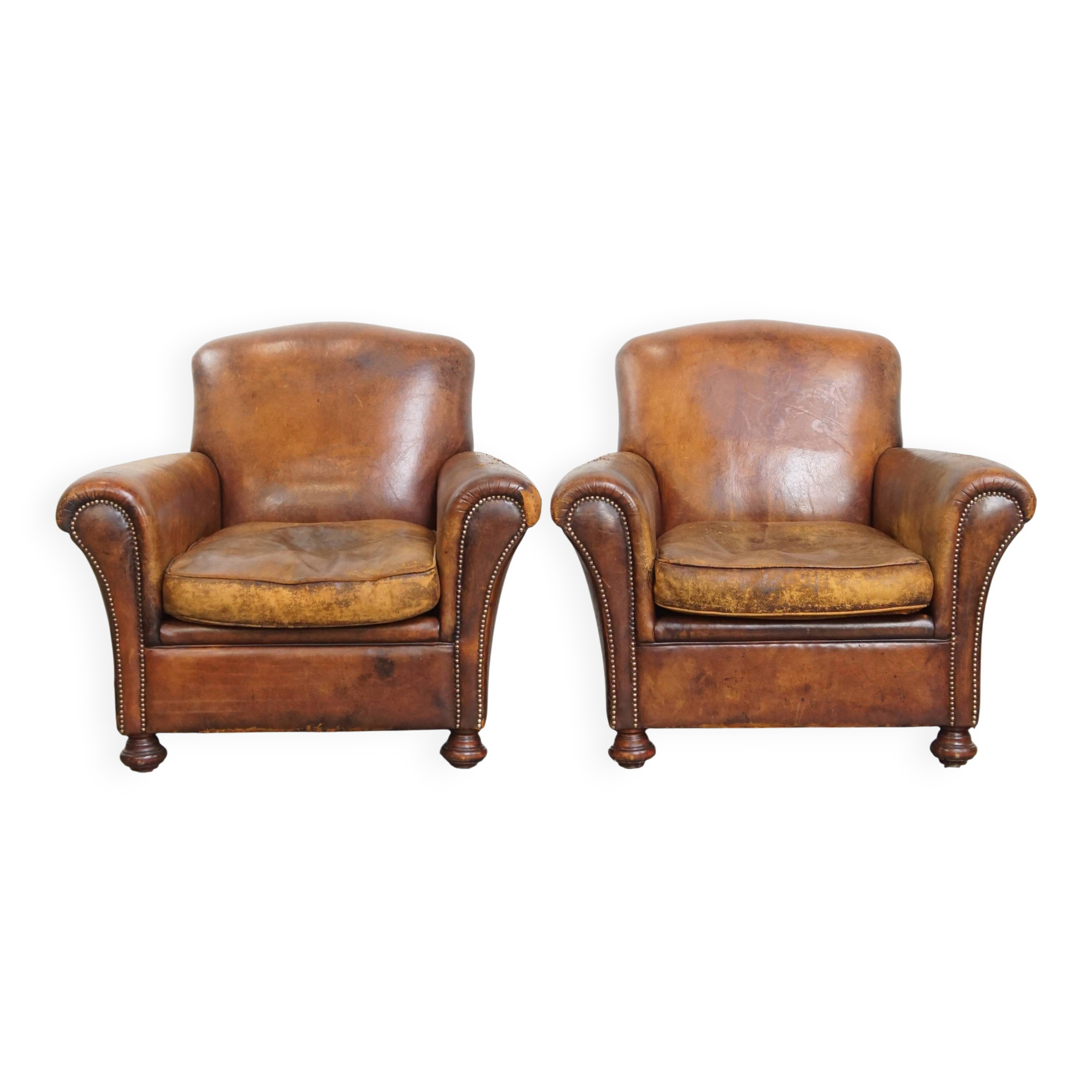 Set of 2 vintage sheepskin leahter armchairs