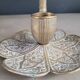 Ornate brass pipe candlestick