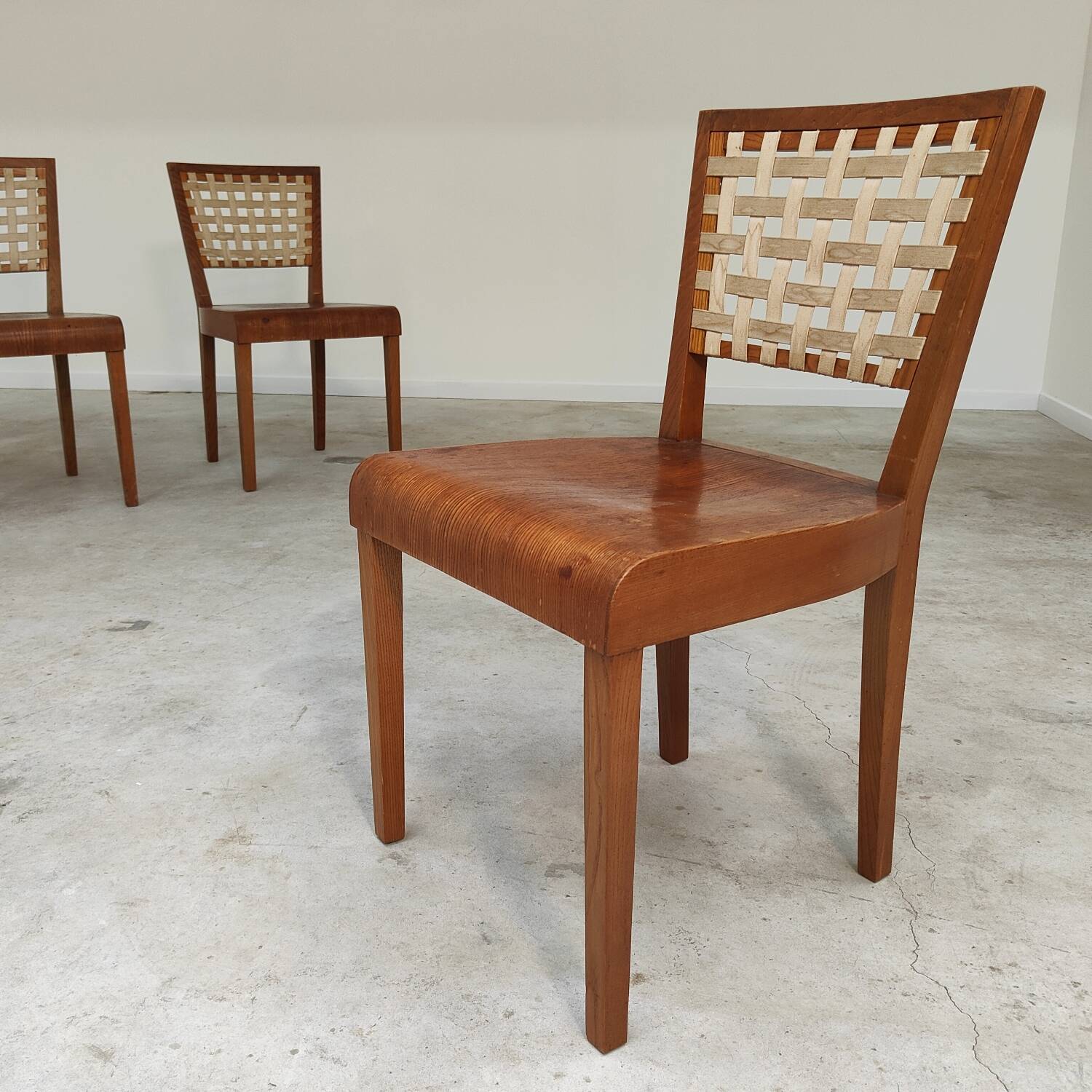 Series of 4 wood and strap chairs by Krasna Jizba Year 40