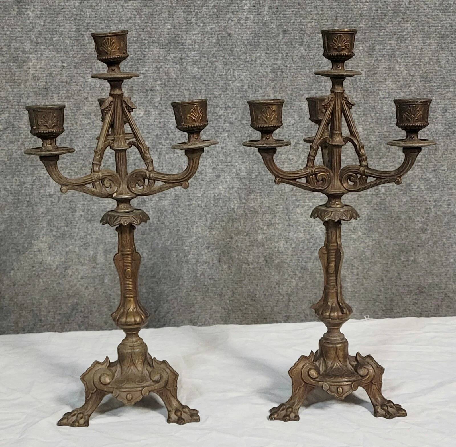 Pair of antique candelabra in patinated bronze spelter