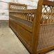 Wood and wicker children's bed from the 50s and 60s.