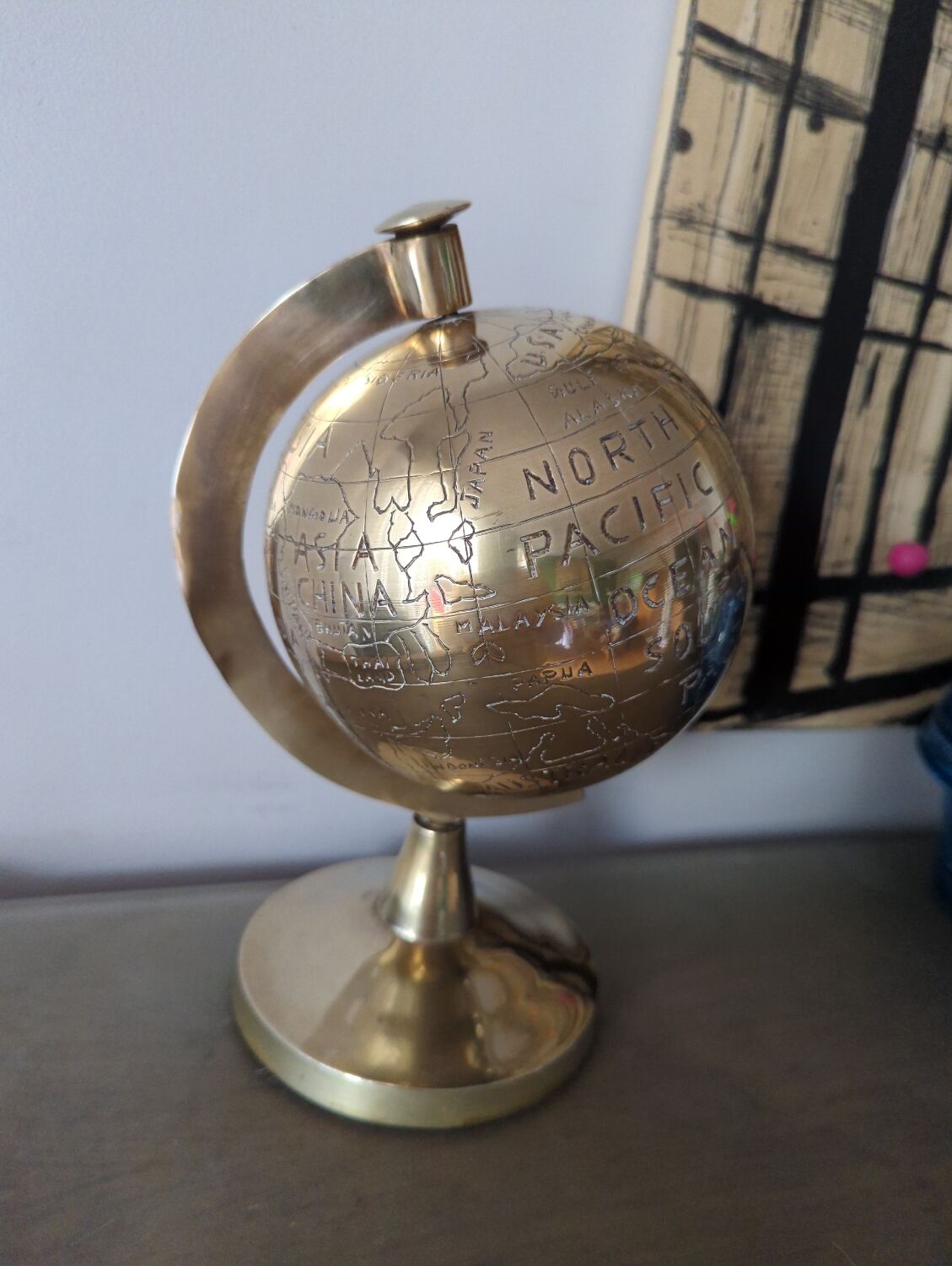 Vintage gilded brass world map