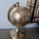 Vintage gilded brass world map