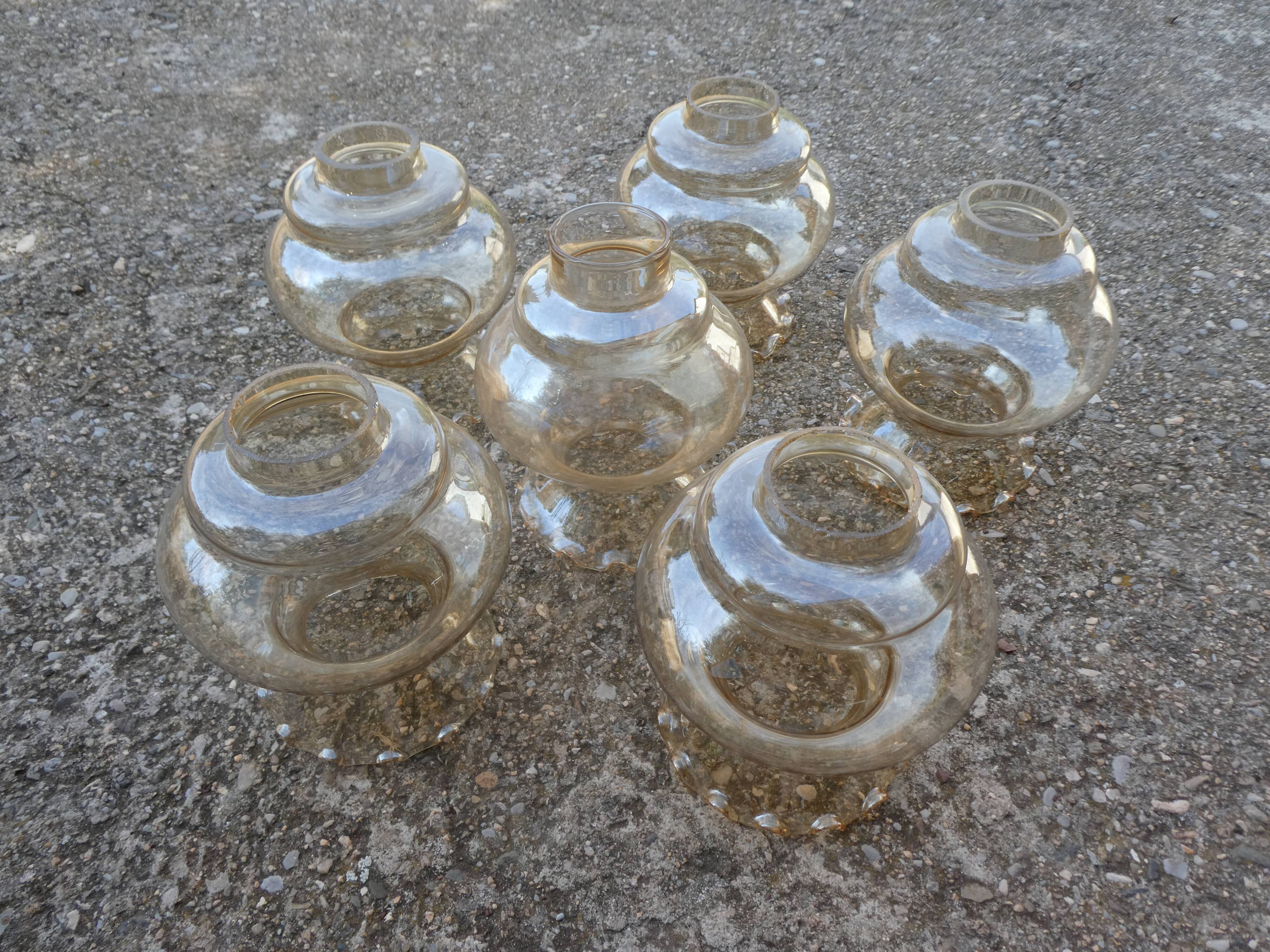 Set of 6 amber glass globes.