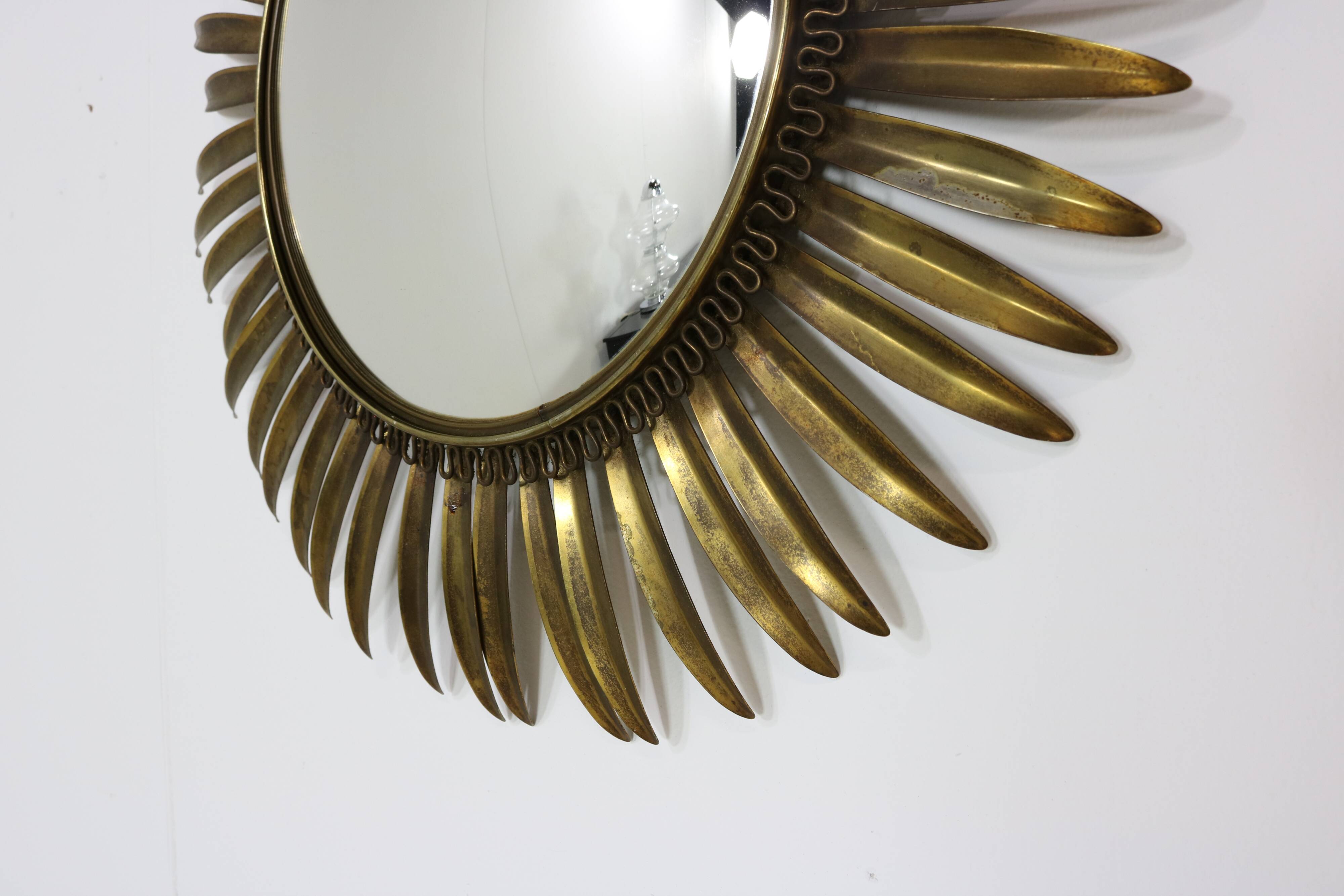 Typical midcentury sunburst wall mirror