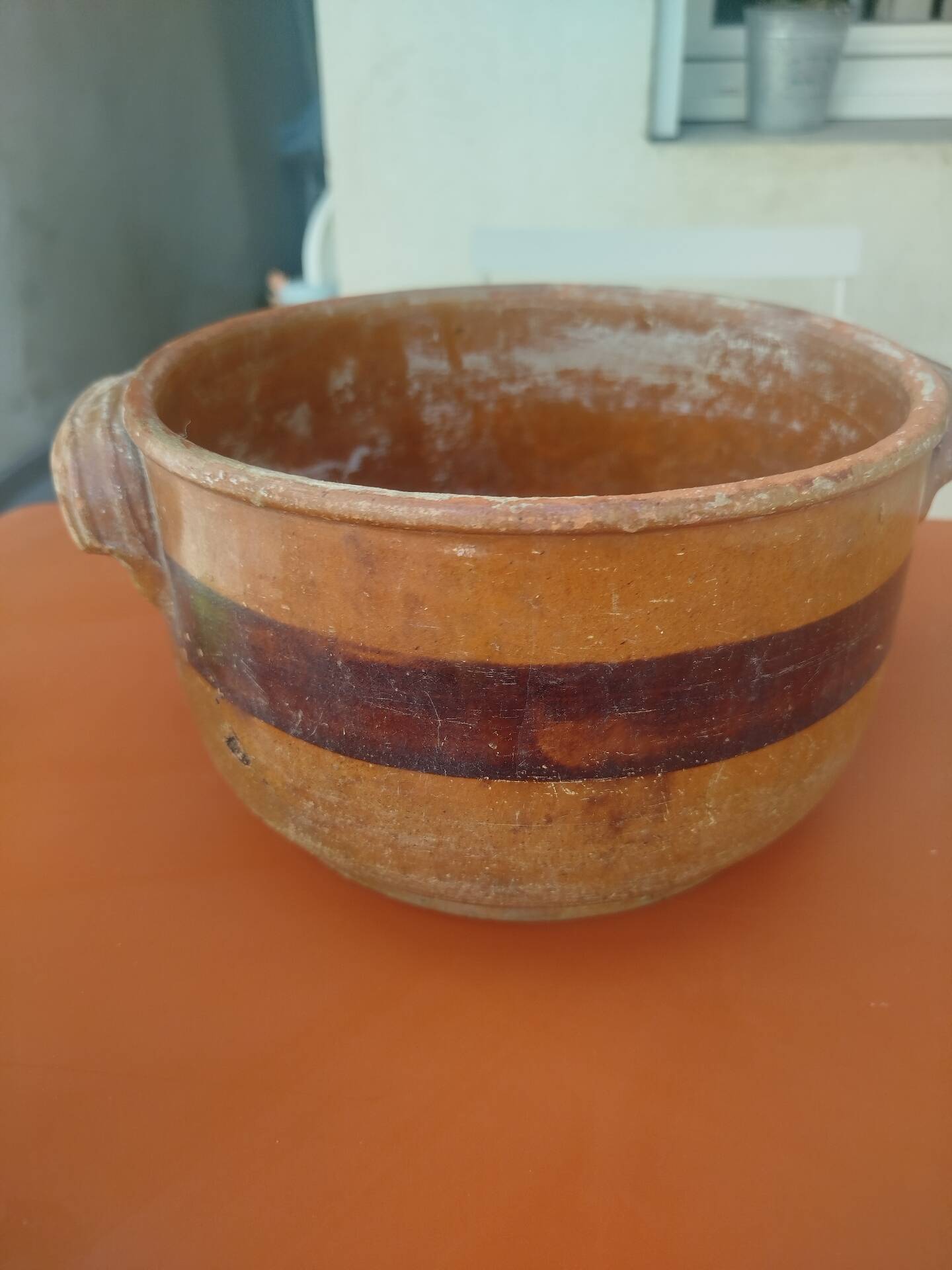 Old terracotta casserole