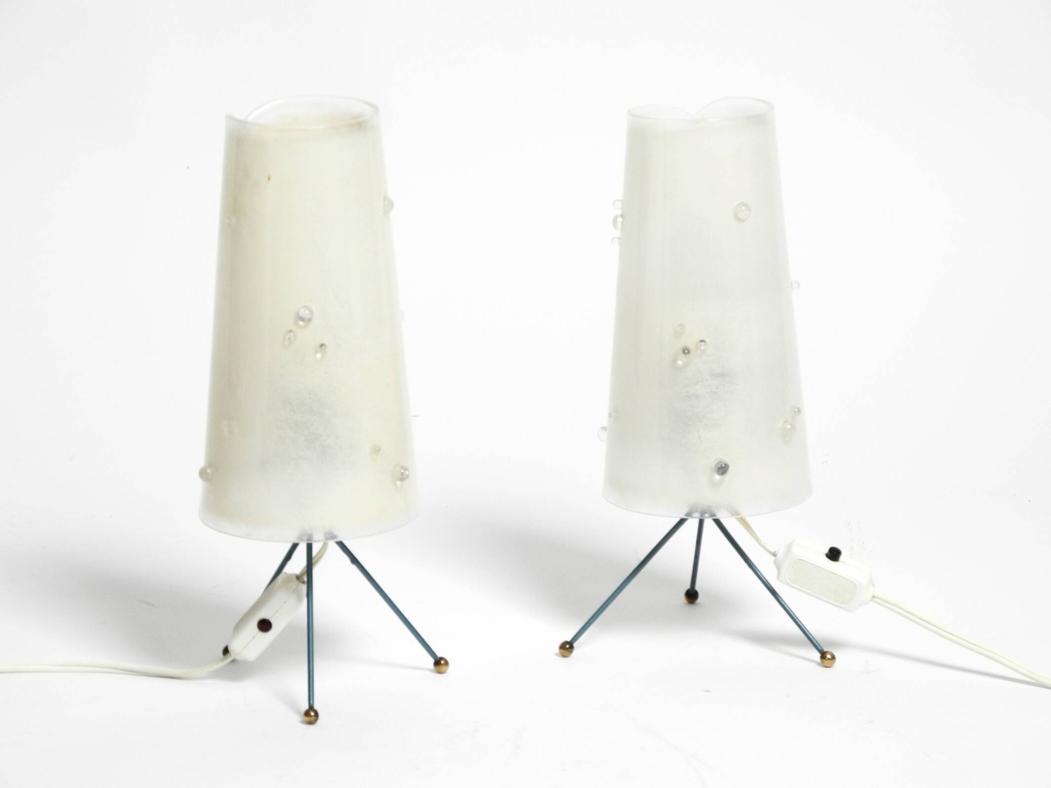 Two very Mid Century Modern tripod table lamps with white plexiglas shades
