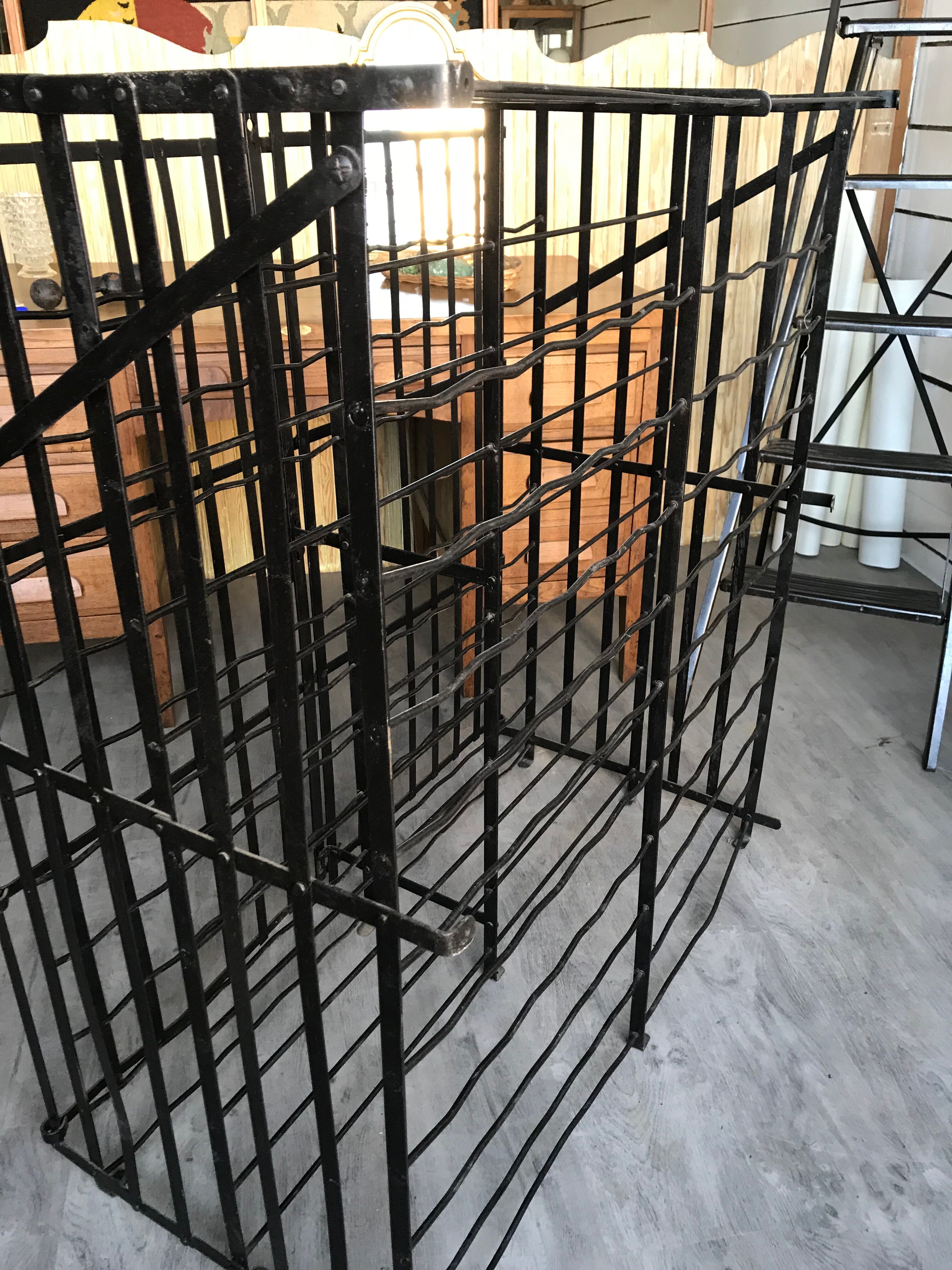 wine in metal cage wine cellar