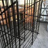 wine in metal cage wine cellar