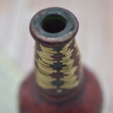 Set of 2 decorative vintage bottles covered with leather & wicker