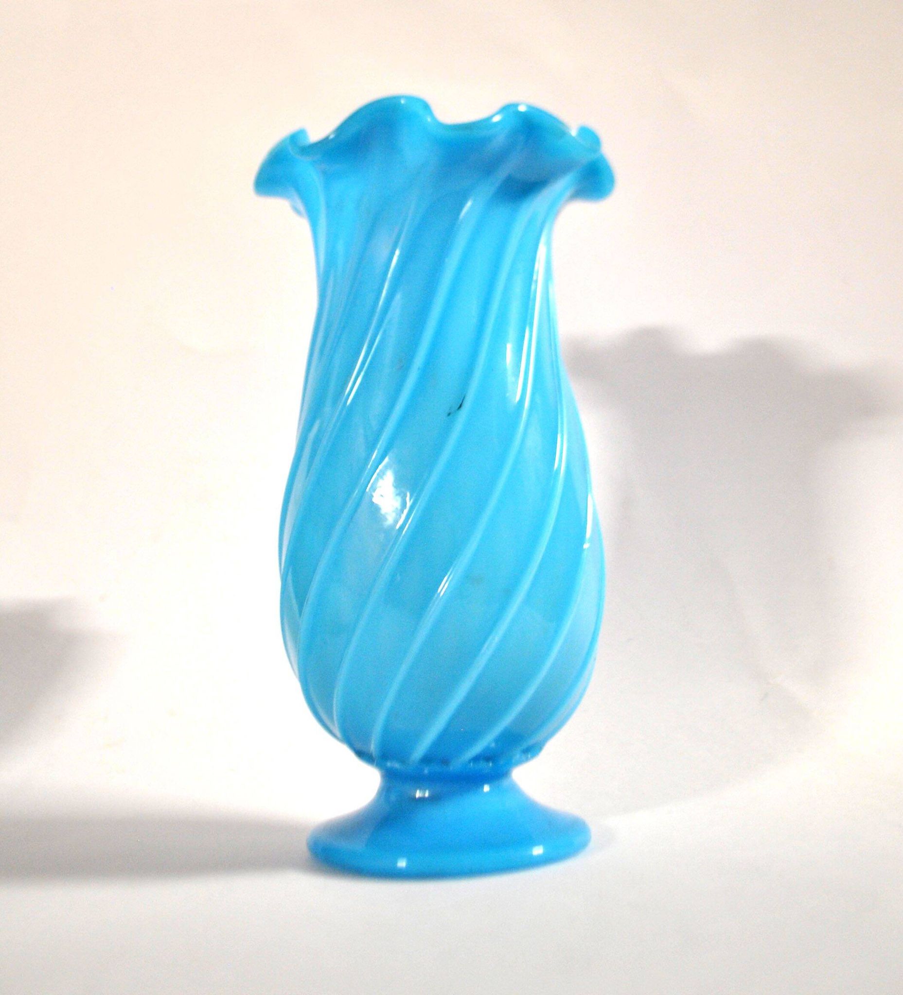 Vallerysthal antique vase in blown turquoise opaline with twisted ribs.