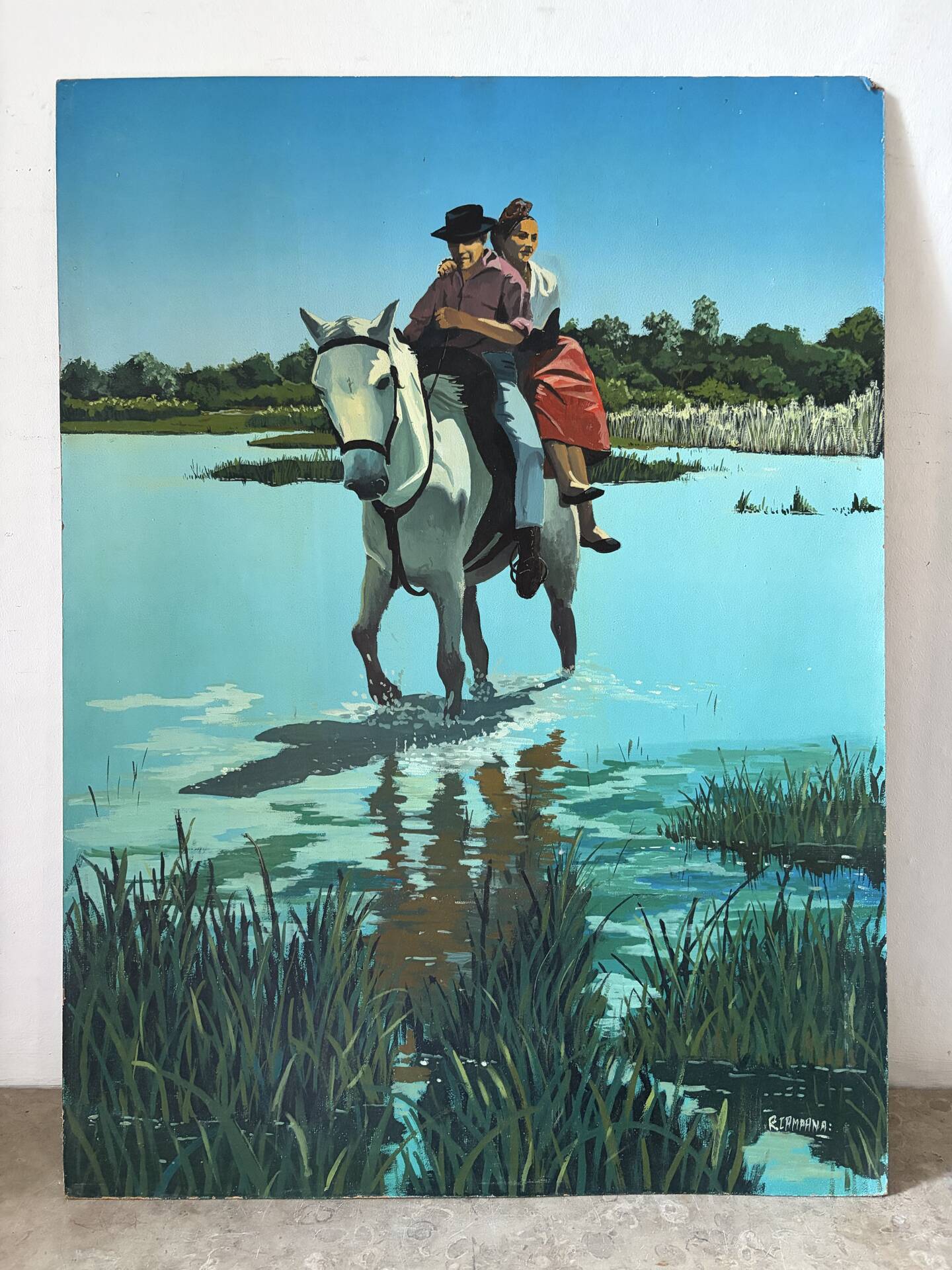 River crossing on horseback, on a sign by Campana.