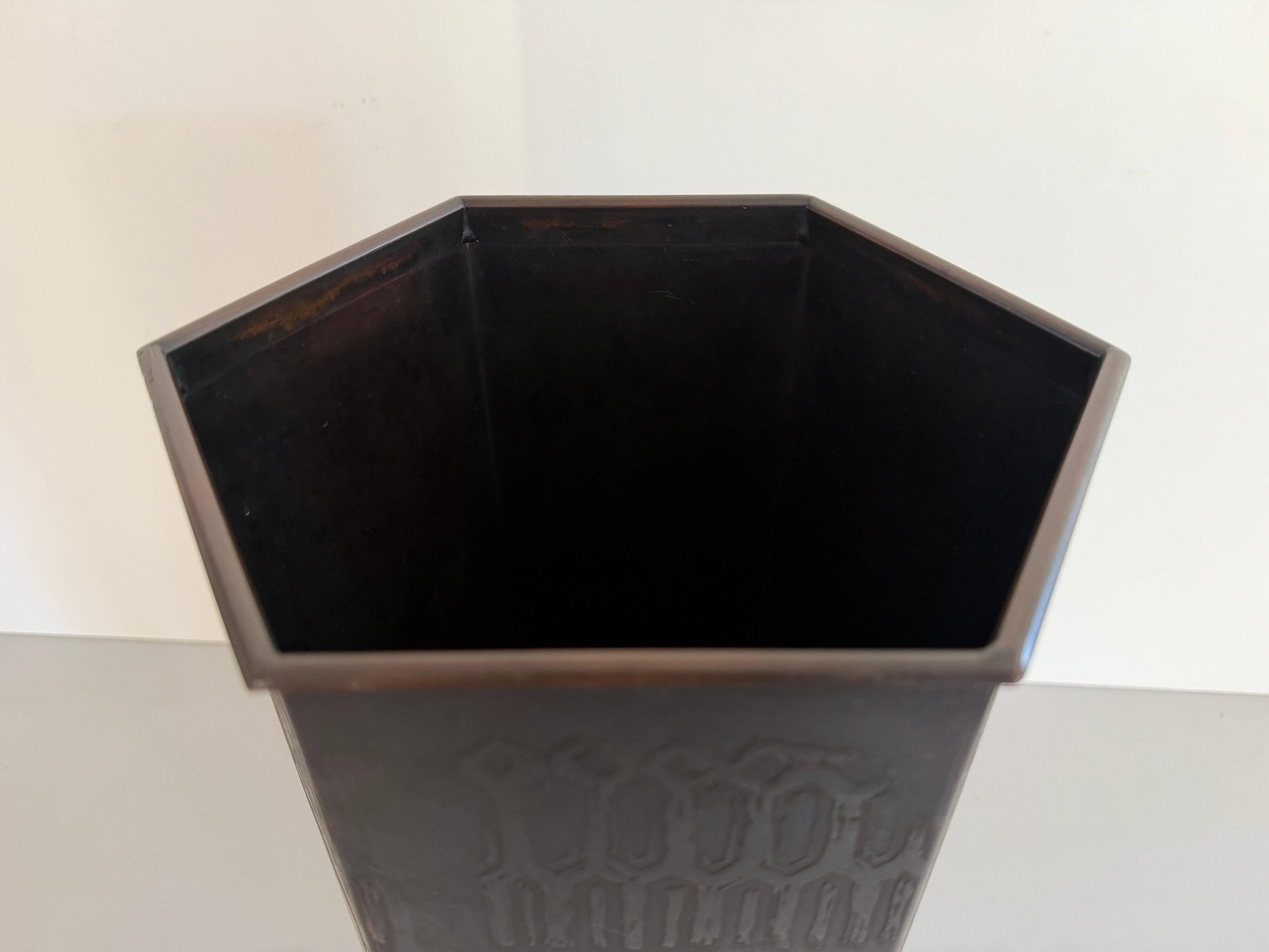 Hexagonal copper umbrella stand signed by the artist, 1960s, Italy.