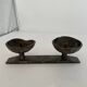 Wrought iron candlestick in brutalist style