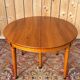 Louis XVI style dining table in cherry wood with extension.