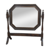 Antique beveled octagonal vanity mirror in carved wood