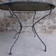 Ancienne table de jardin ronde en fer