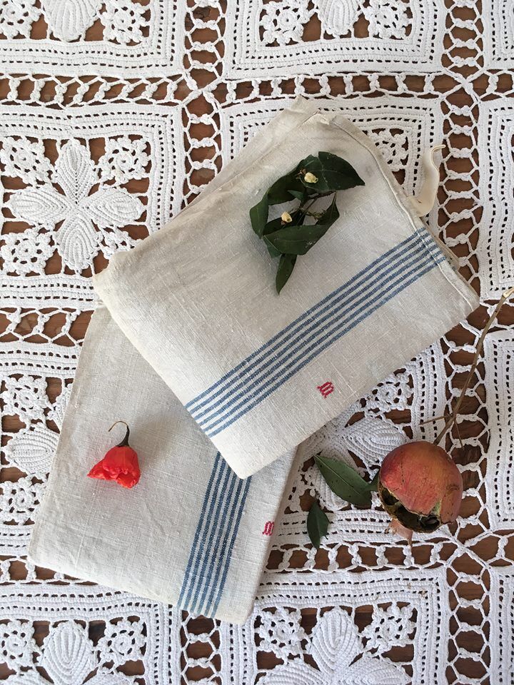 Pair of old dishcloths at marked blue stripes m.