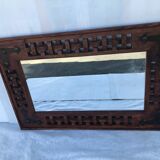 Miroir en tech ancien sculpté