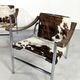 Pair of LC1 cow skin chairs by Le Corbusier for Cassina 1970
