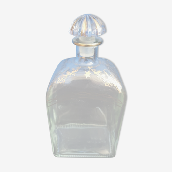 Glass liquor carafe with pattern and gilding.